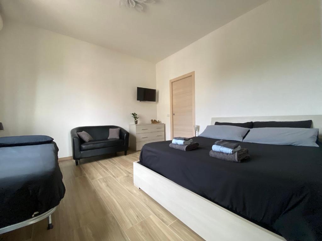 Postel nebo postele na pokoji v ubytování Casa Ferrari
