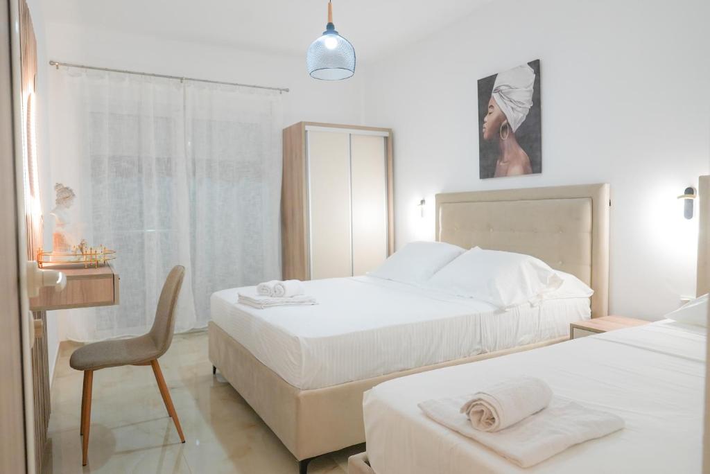 Postel nebo postele na pokoji v ubytování Mar nero Apartments