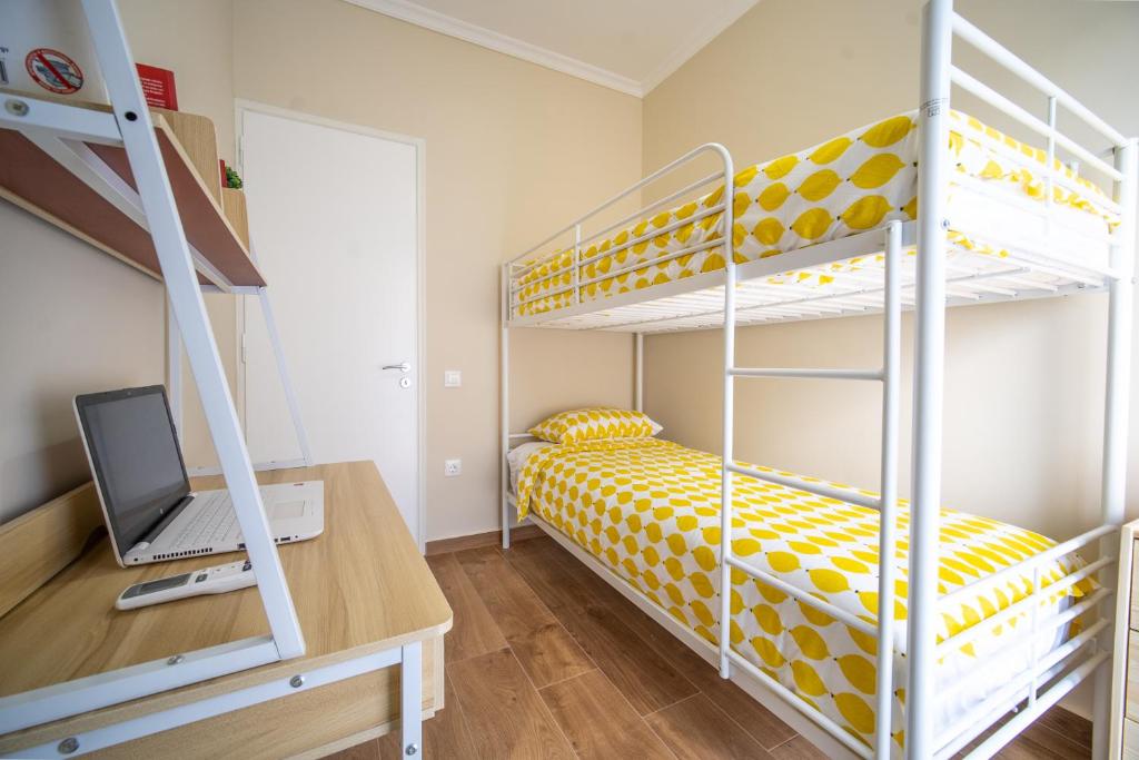 Postel nebo postele na pokoji v ubytování ΜΚ Αpartment 2ΥΔ - Nikea Metro