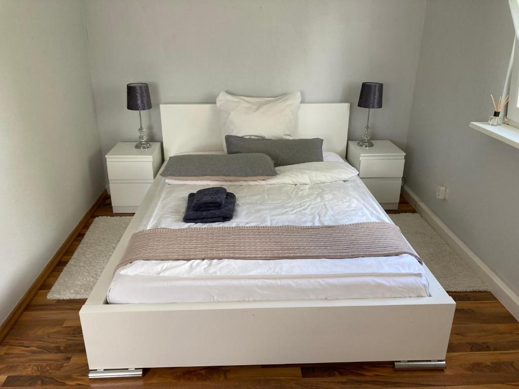 Postel nebo postele na pokoji v ubytování Wohnung 21