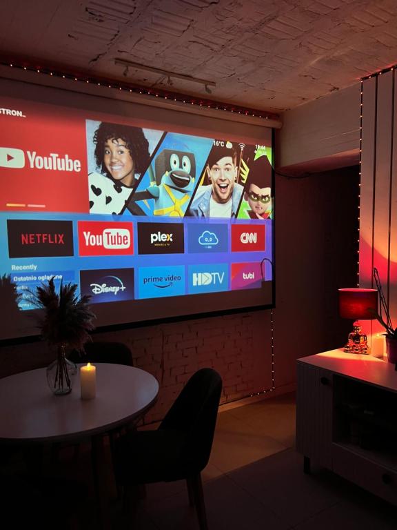 TV a/nebo společenská místnost v ubytování DNA Apartment
