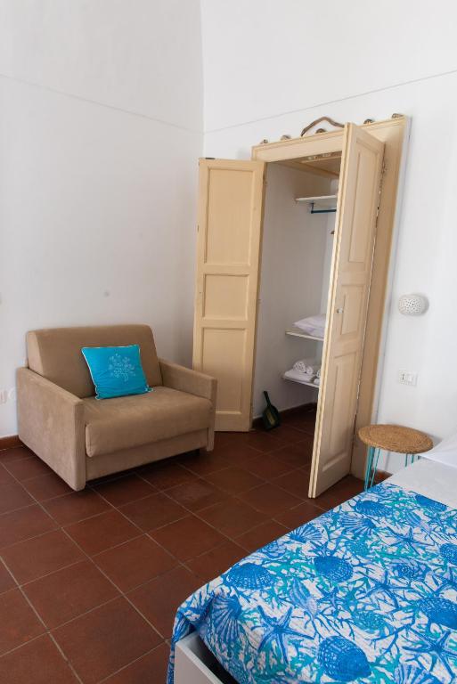 Postel nebo postele na pokoji v ubytování Casa Chicchella- Authentic Experience