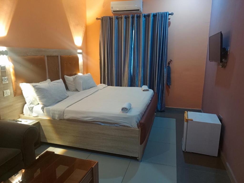 Postel nebo postele na pokoji v ubytování FIBIS HOTEL