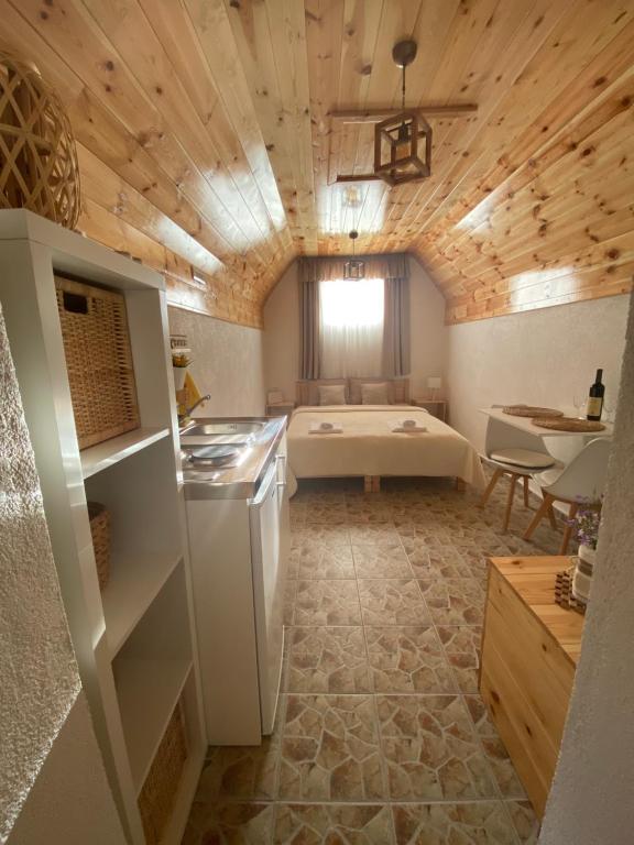 Kuchyň nebo kuchyňský kout v ubytování Apartment & Rooms Sweet Dreams