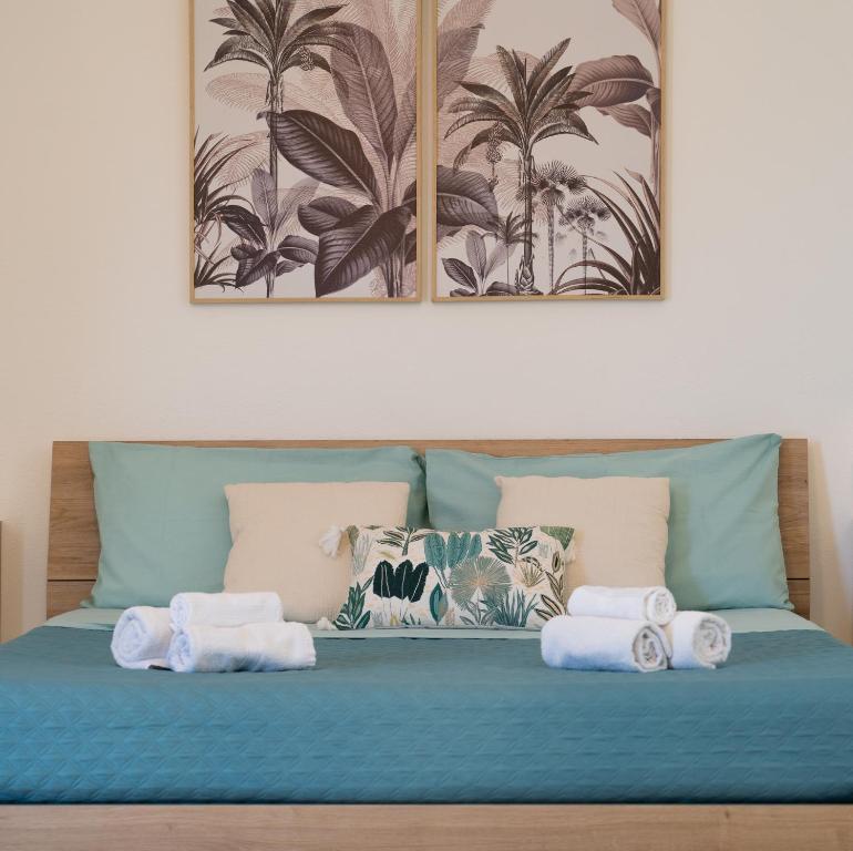 Postel nebo postele na pokoji v ubytování Il Vicolo - Vacanze in Sardegna