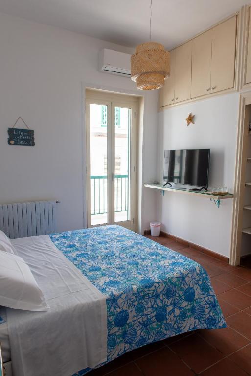 Postel nebo postele na pokoji v ubytování Casa Chicchella- Authentic Experience