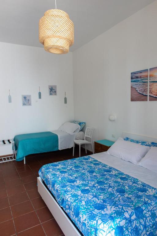 Postel nebo postele na pokoji v ubytování Casa Chicchella- Authentic Experience