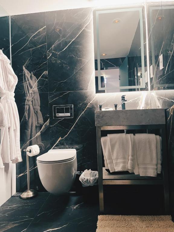 Koupelna v ubytování Hotel Kutuma
