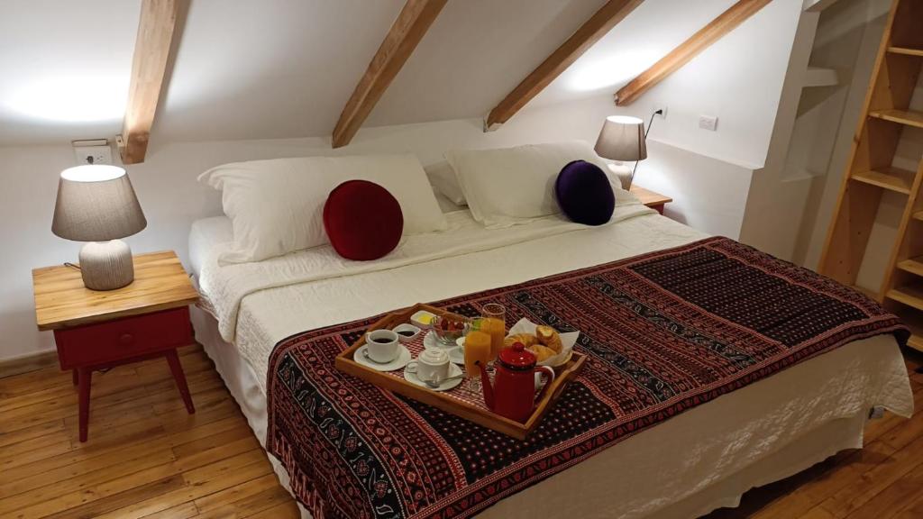 Postel nebo postele na pokoji v ubytování Iguanazu Bed & Breakfast