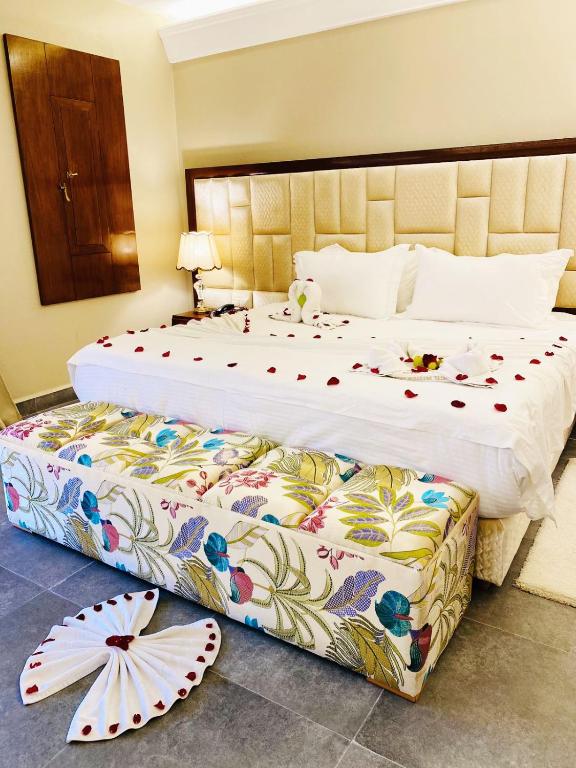 Postel nebo postele na pokoji v ubytování Hotel Prestige Agadir Boutique & SPA