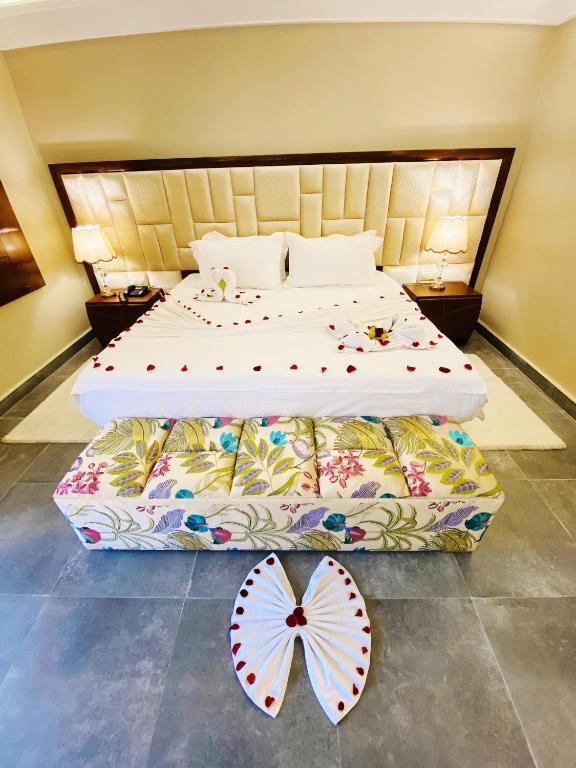 Postel nebo postele na pokoji v ubytování Hotel Prestige Agadir Boutique & SPA