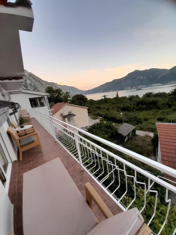 a balcony with a view of the water at Lux apartmani Darija in Kotor
