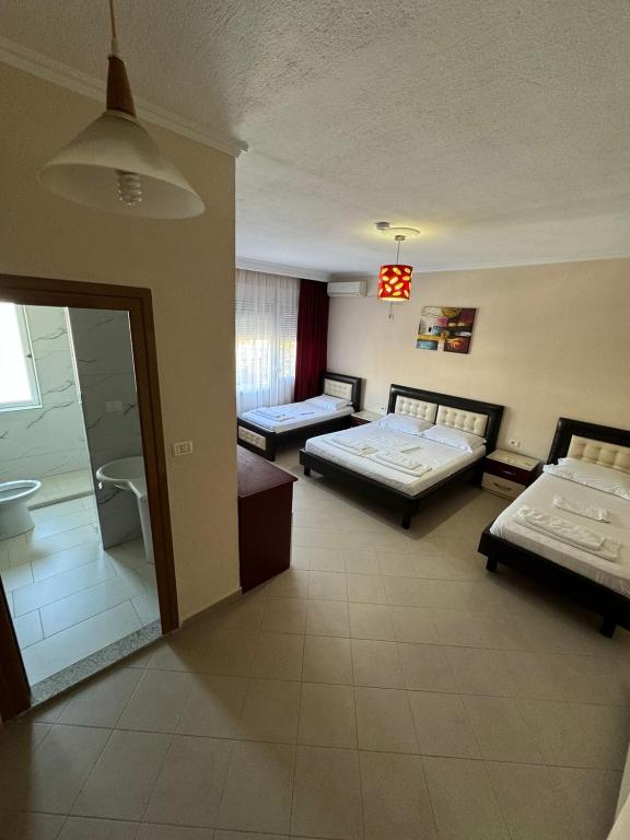Llit o llits en una habitació de Hotel Freskia