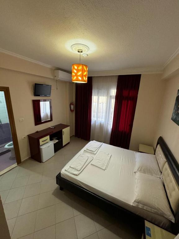 Llit o llits en una habitació de Hotel Freskia