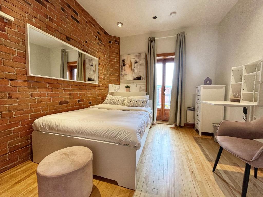Postel nebo postele na pokoji v ubytování Auberge du Plateau