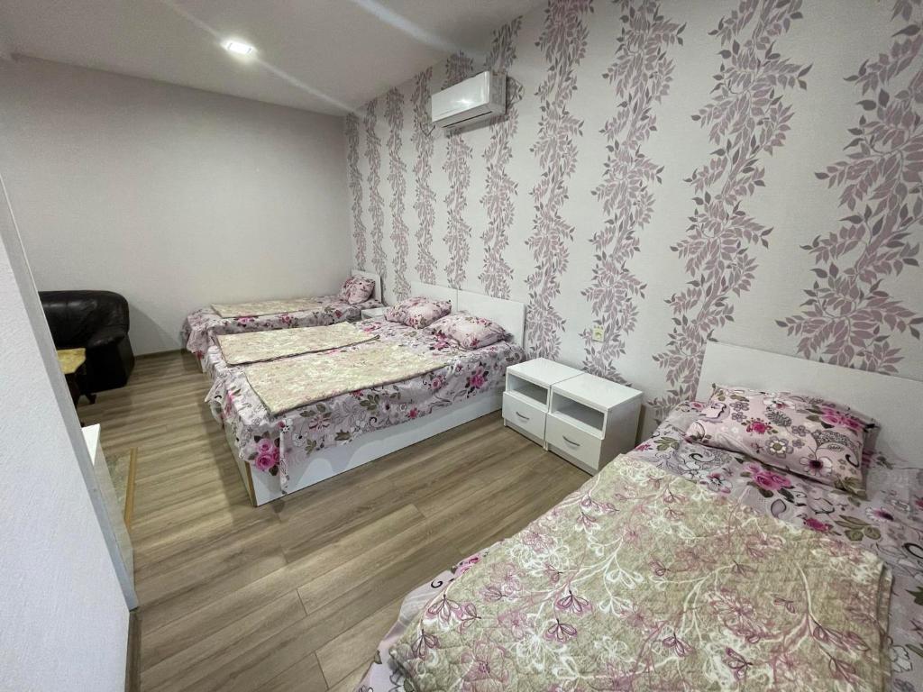 Postel nebo postele na pokoji v ubytování Hotel Alley