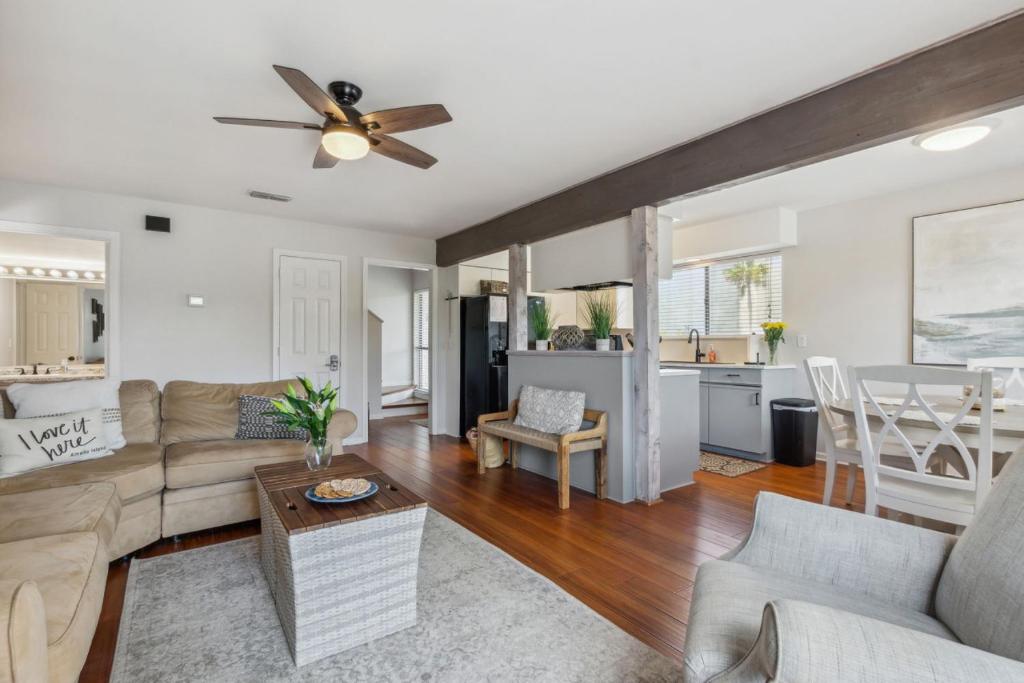 a living room with a couch and a table at 2625 Forest Ridge - Pool - Tennis - Pickleball - Large Deck in Fernandina Beach