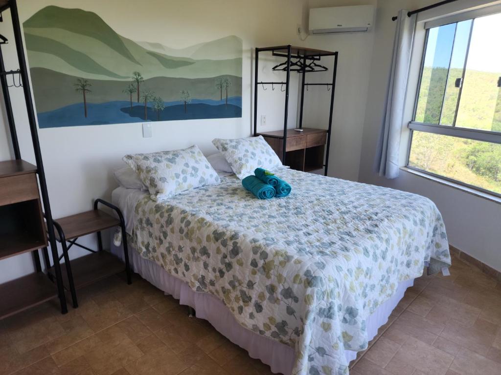 Postel nebo postele na pokoji v ubytování Bangalô São Jorge - Ecohospedagem Canto da Coruja