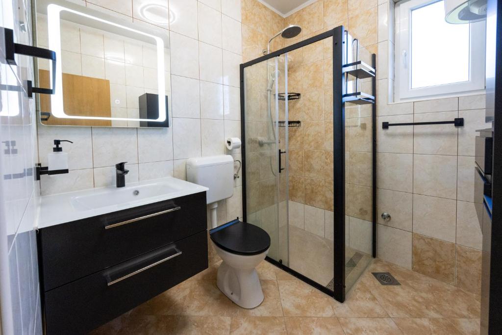 Łazienka w obiekcie Apartment Nikoleto