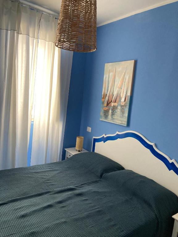 Una cama o camas en una habitación de Al Mari Suites