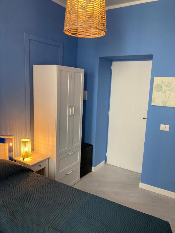 Una cama o camas en una habitación de Al Mari Suites