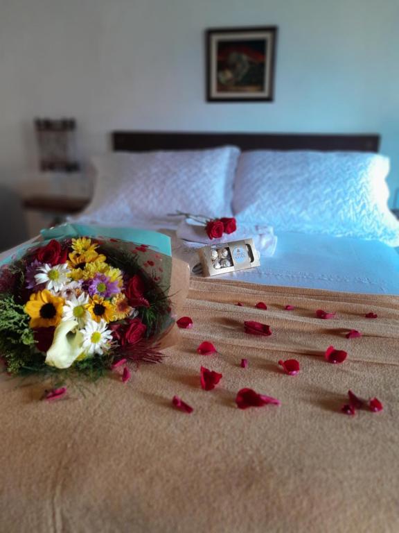 Cama ou camas em um quarto em Santa Monica Hospedaria