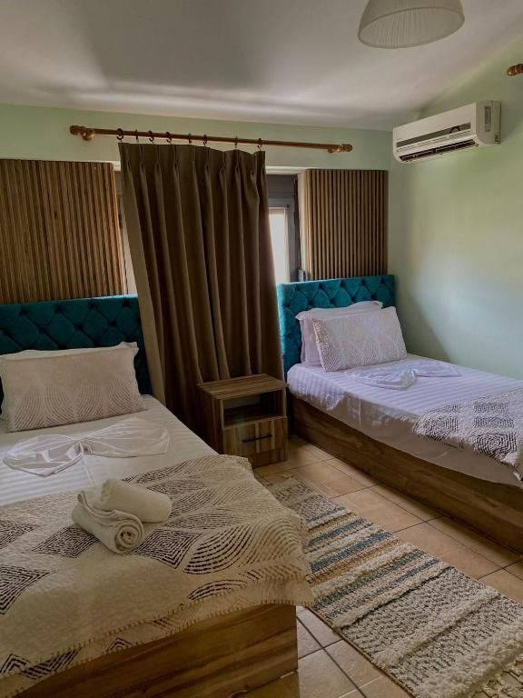 Postel nebo postele na pokoji v ubytování Hotel Zen