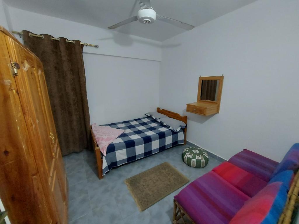 Postel nebo postele na pokoji v ubytování Anglo Chalets - Ageeba beach