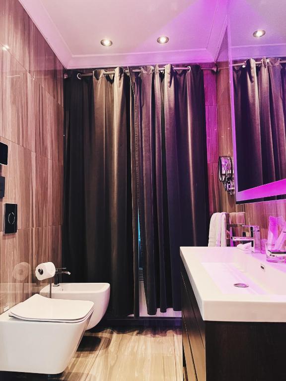 Koupelna v ubytování Hotel Kutuma