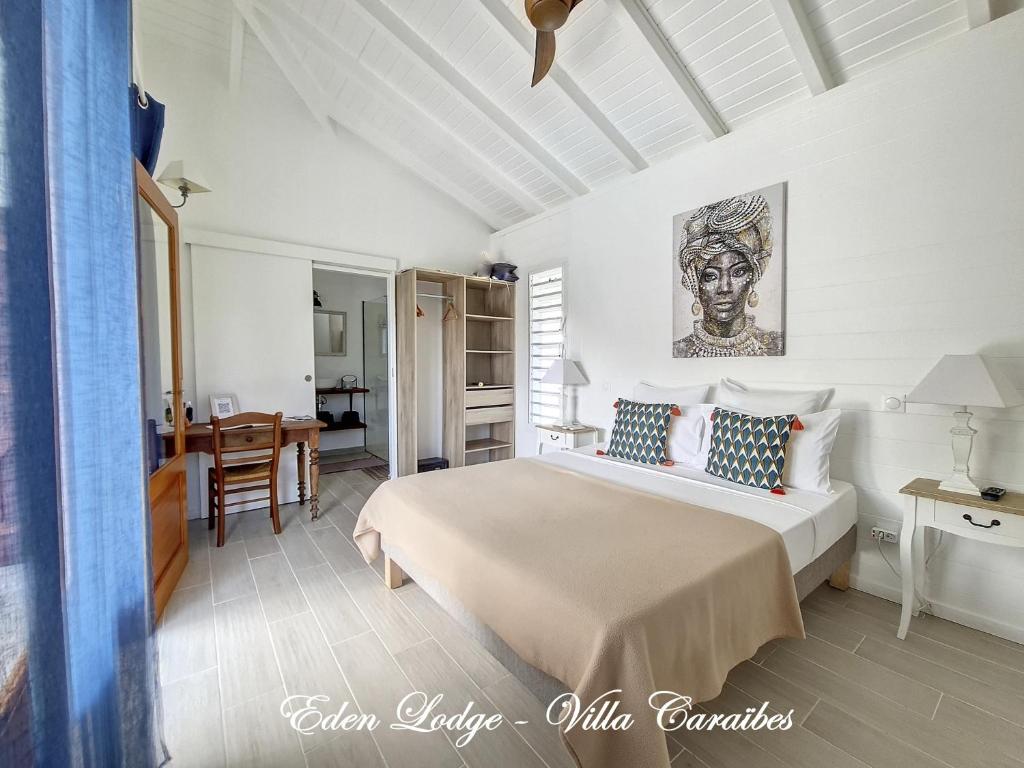 Postel nebo postele na pokoji v ubytování Eden Lodge 4 Villas avec piscine privée