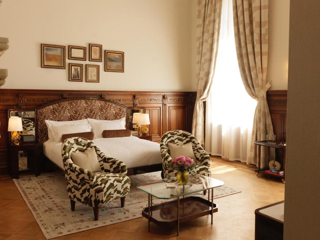 Postel nebo postele na pokoji v ubytování Hotel Fleur de Ville