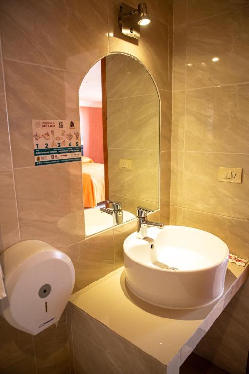 Koupelna v ubytování Hotel Posada Del Parque