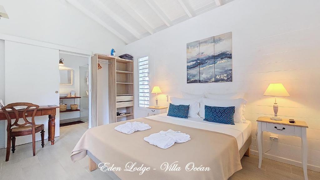 Postel nebo postele na pokoji v ubytování Eden Lodge 4 Villas avec piscine privée