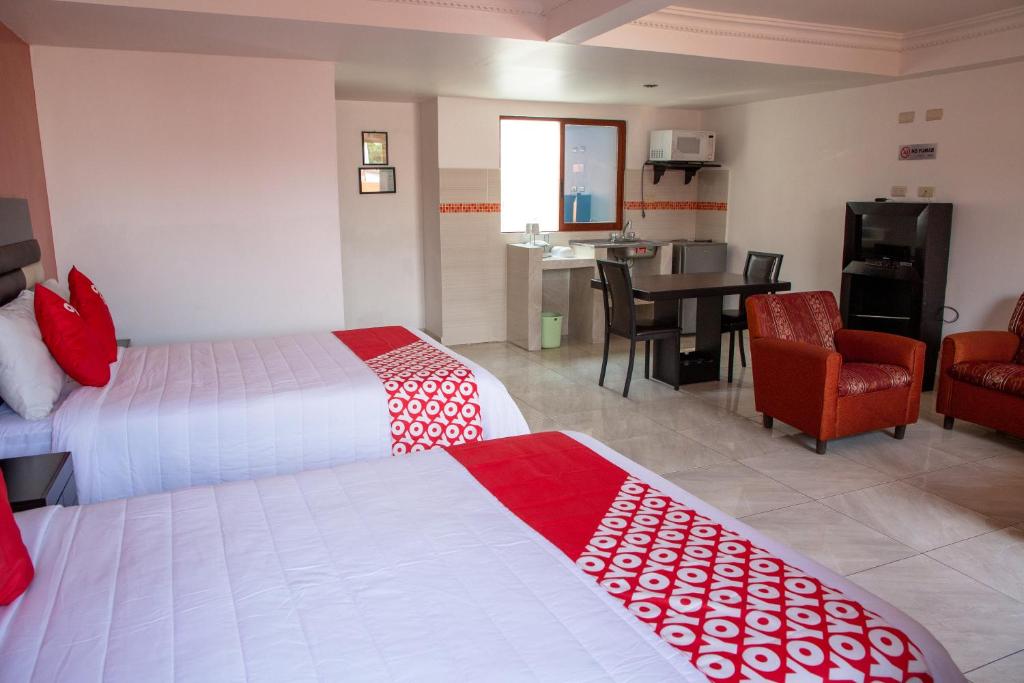 Postel nebo postele na pokoji v ubytování Hotel Posada Del Parque
