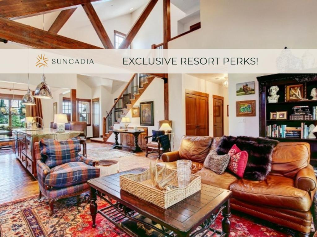 a living room with a couch and a table at Suncadia 3 Bdrm Pet Friendly Home with Hot Tub in Cle Elum