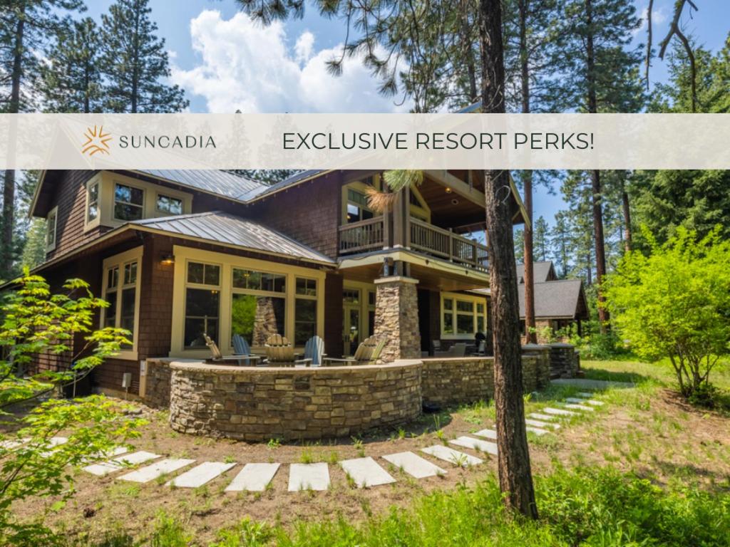 a house with a sign that reads exclusive resort perominium at Family Home, Hot Tub, Suncadia Pool Access in Cle Elum
