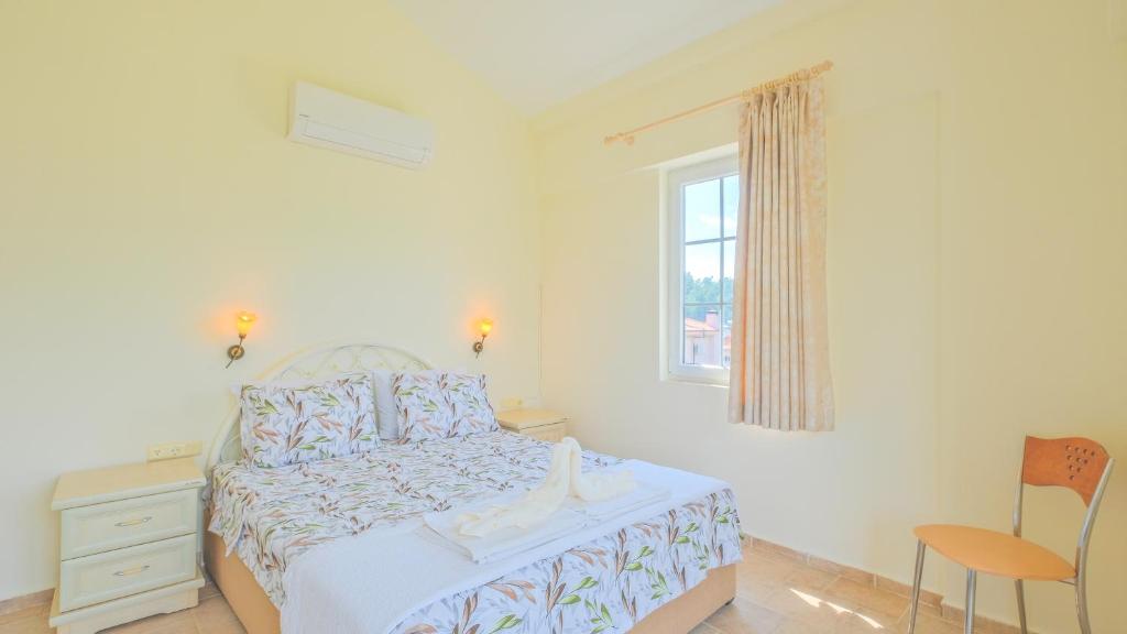 Postel nebo postele na pokoji v ubytování Villa Bemar