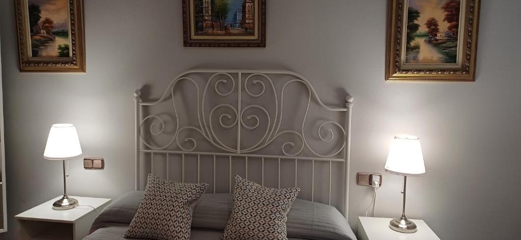 Katil atau katil-katil dalam bilik di Ático 2 dormitorios y apartamento 2 dormitorios