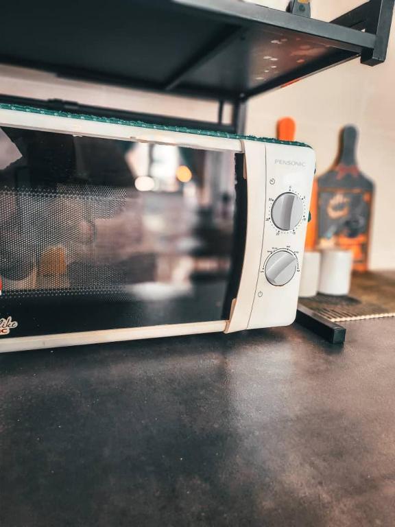 Kuchyň nebo kuchyňský kout v ubytování BotakCuteHomestayBaliResidence