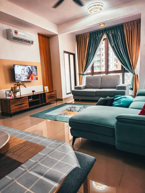 TV a/nebo společenská místnost v ubytování BotakCuteHomestayBaliResidence
