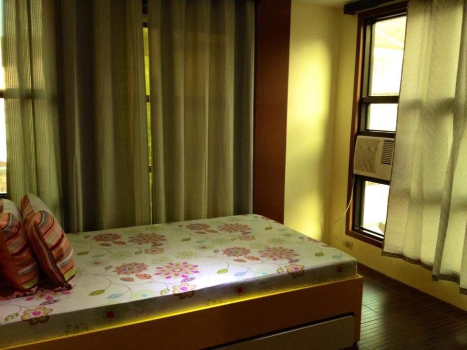 Postel nebo postele na pokoji v ubytování DRA Hotel