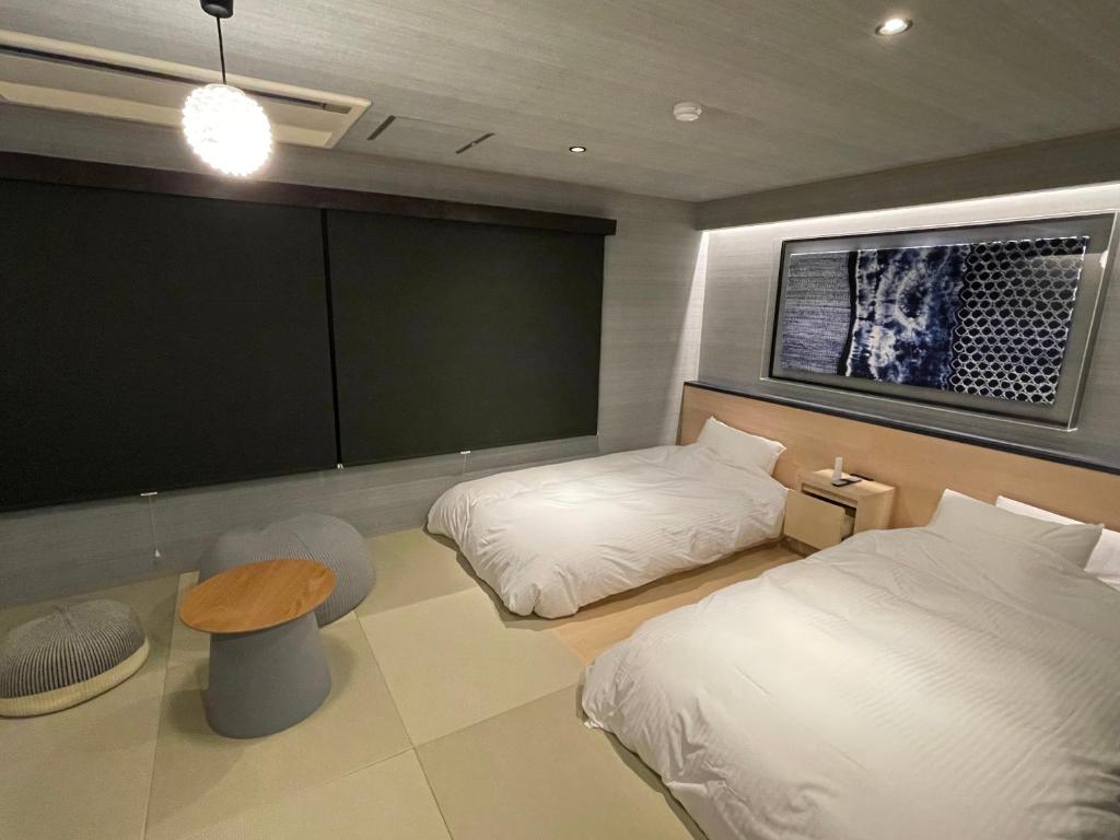 Letto o letti in una camera di Ryokan Miyoshi