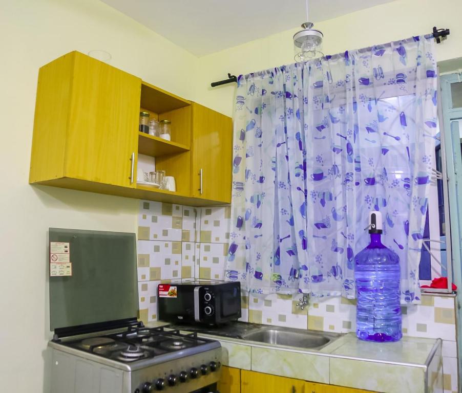 Kuchyň nebo kuchyňský kout v ubytování Vee Apartment