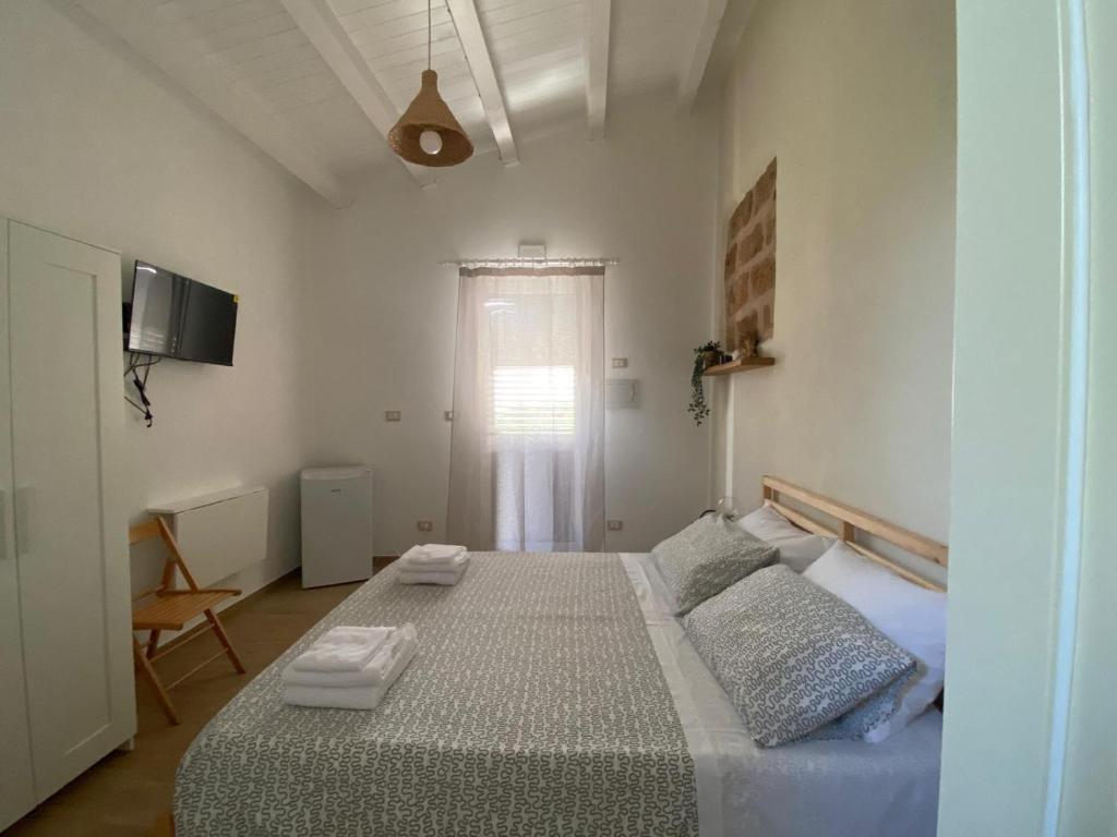 Postel nebo postele na pokoji v ubytování Can Mar