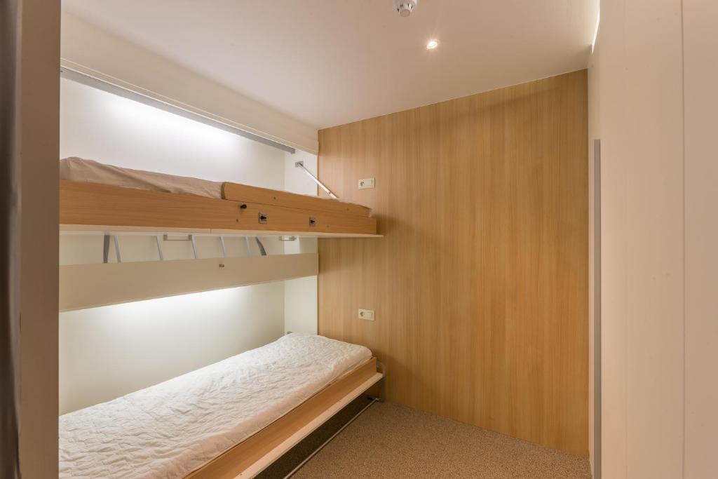 Postel nebo postele na pokoji v ubytování Vakantie Domein Ter Helme