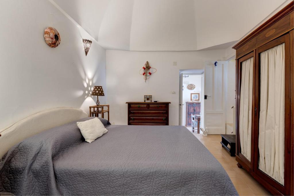 Voodi või voodid majutusasutuse Le Bianche Suites Ostuni toas