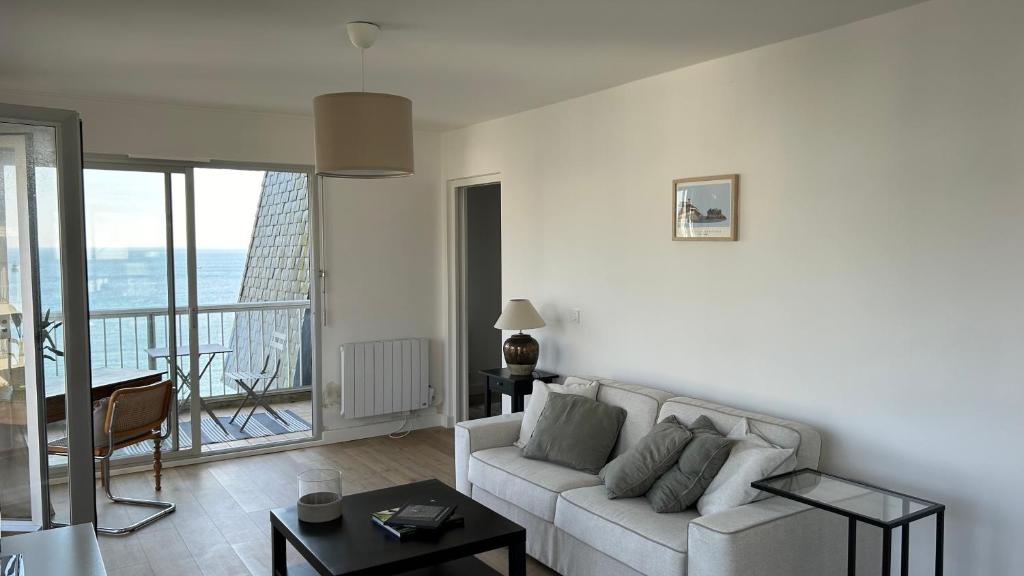 Posezení v ubytování Appartement pied dans l'eau - La Comtesse