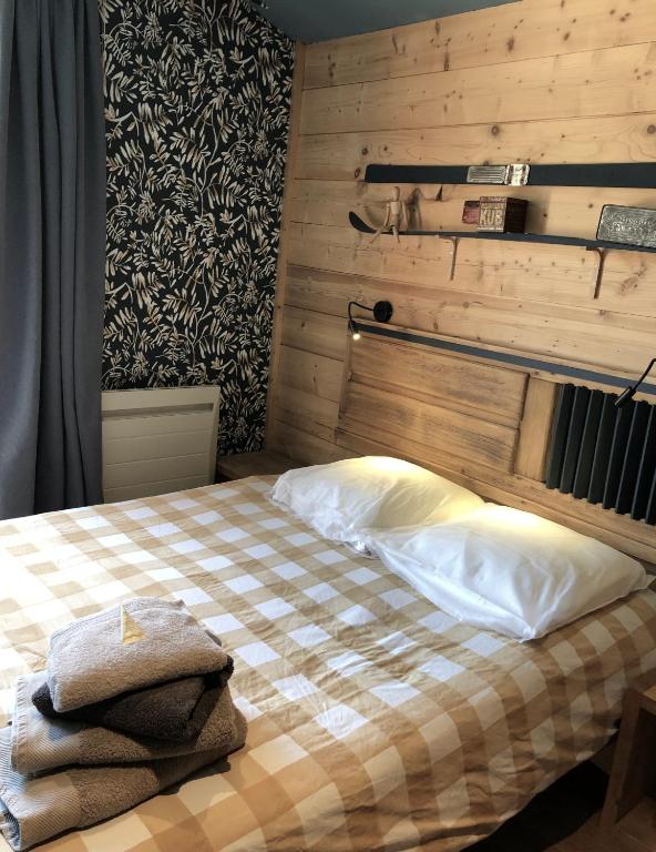 Postel nebo postele na pokoji v ubytování L'Appart'