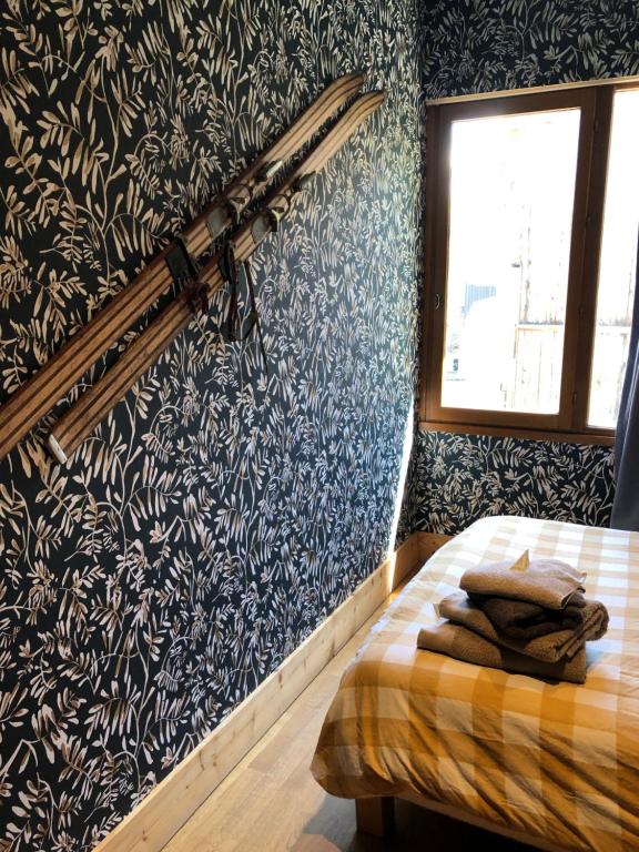 Postel nebo postele na pokoji v ubytování L'Appart'