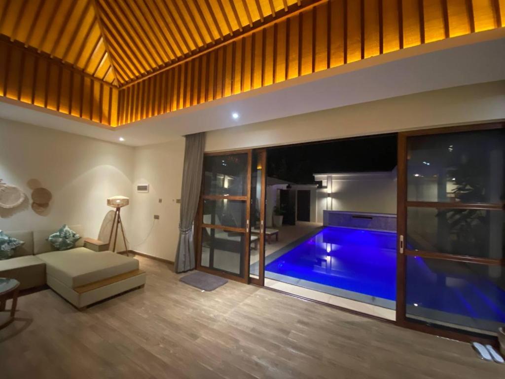 Bazén v ubytování Ream YoHo Resort nebo v jeho okolí